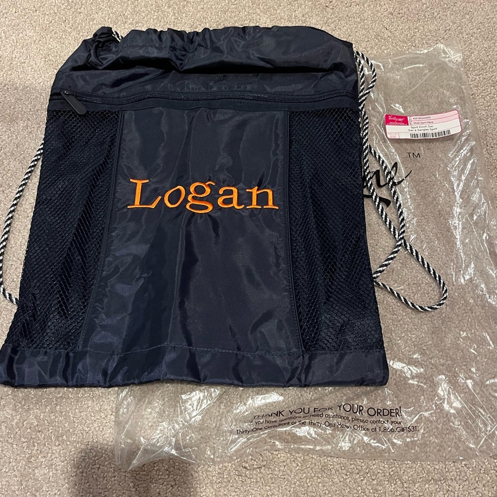 Thirty-One Cinch Sac embroidered with the name Logan